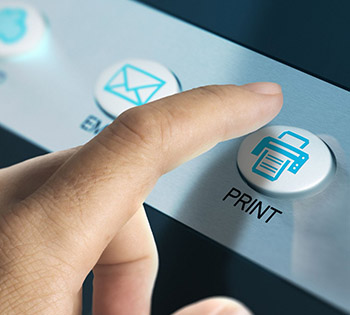 A person pushing a print button on a multifunction printer