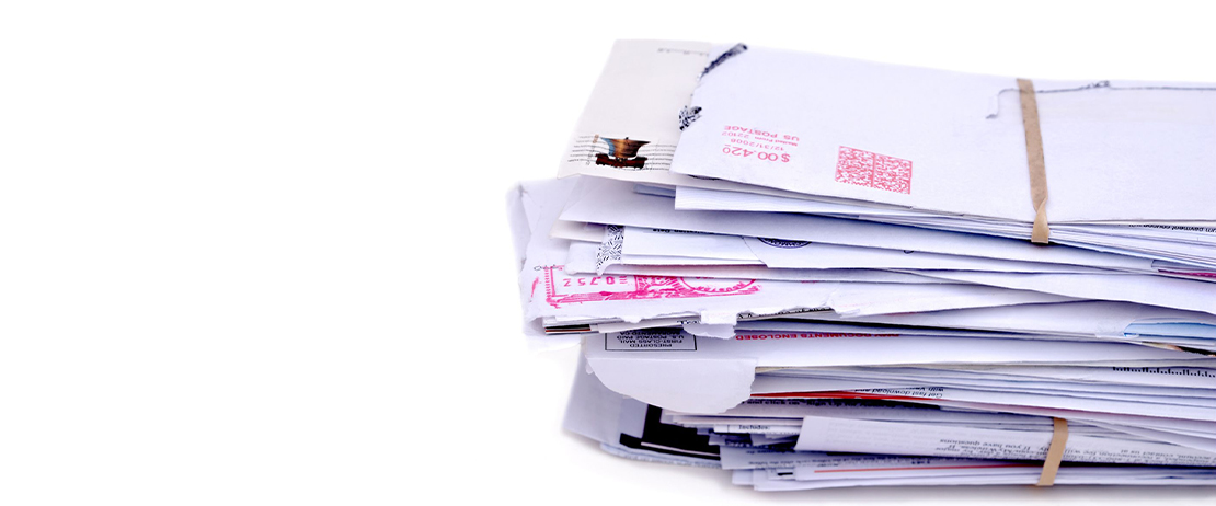 A stack of opened mail