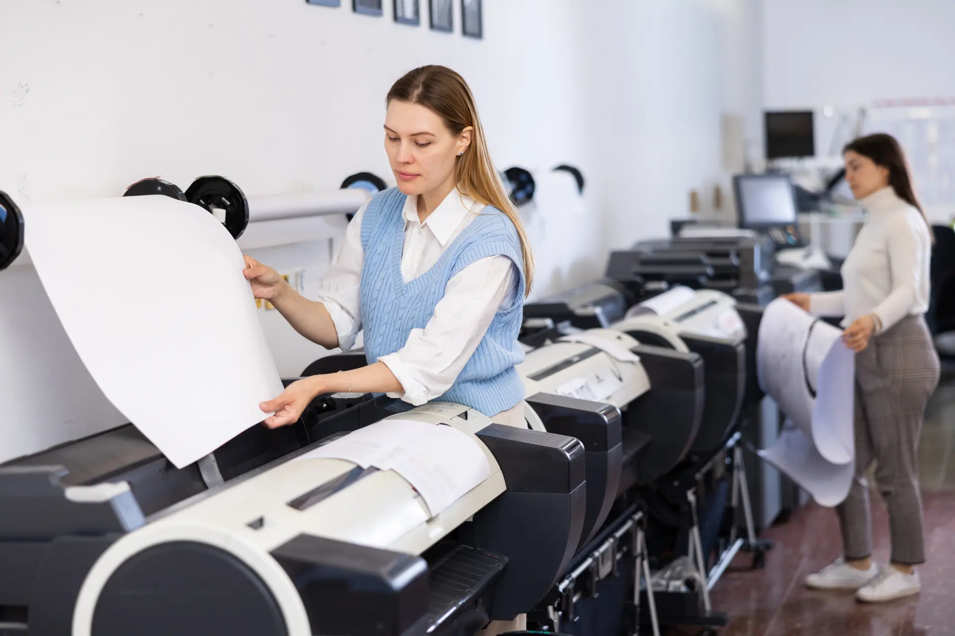 Employees at a printing shop